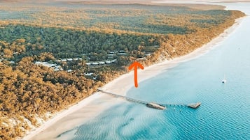 On the beach, sun-loungers