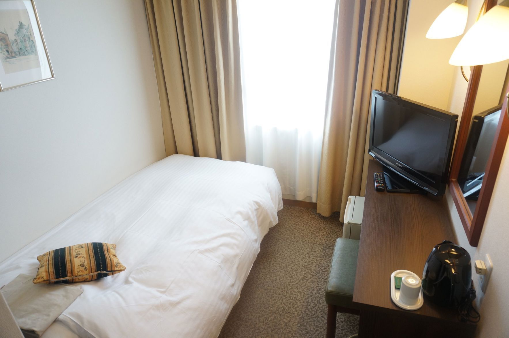 Desk, free WiFi, bed sheets