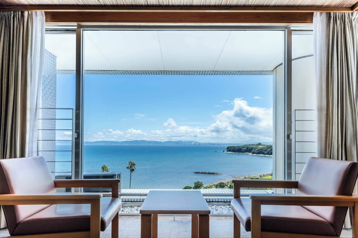 japanese style room for 4 people, shared bathroom, sea view | in-room safe, desk, free wifi, bed sheets