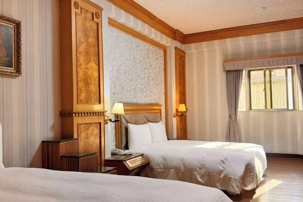 Down comforters, blackout drapes, WiFi (free), bed sheets