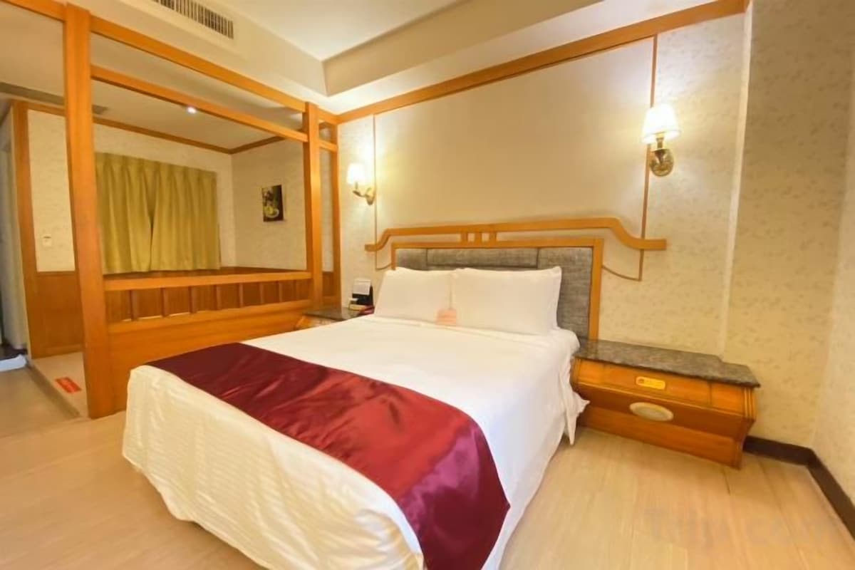 Down comforters, blackout drapes, WiFi (free), bed sheets