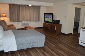 Apartamento de lujo | Zona de estar | Televisión de pantalla plana de 60 pulgadas con canales por cable