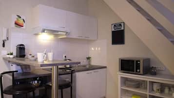 Fridge, microwave, coffee/tea maker, toaster