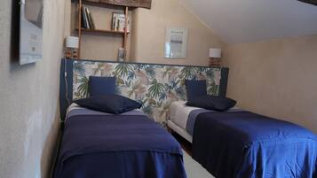 2 habitaciones, tabla de planchar con plancha y acceso a internet