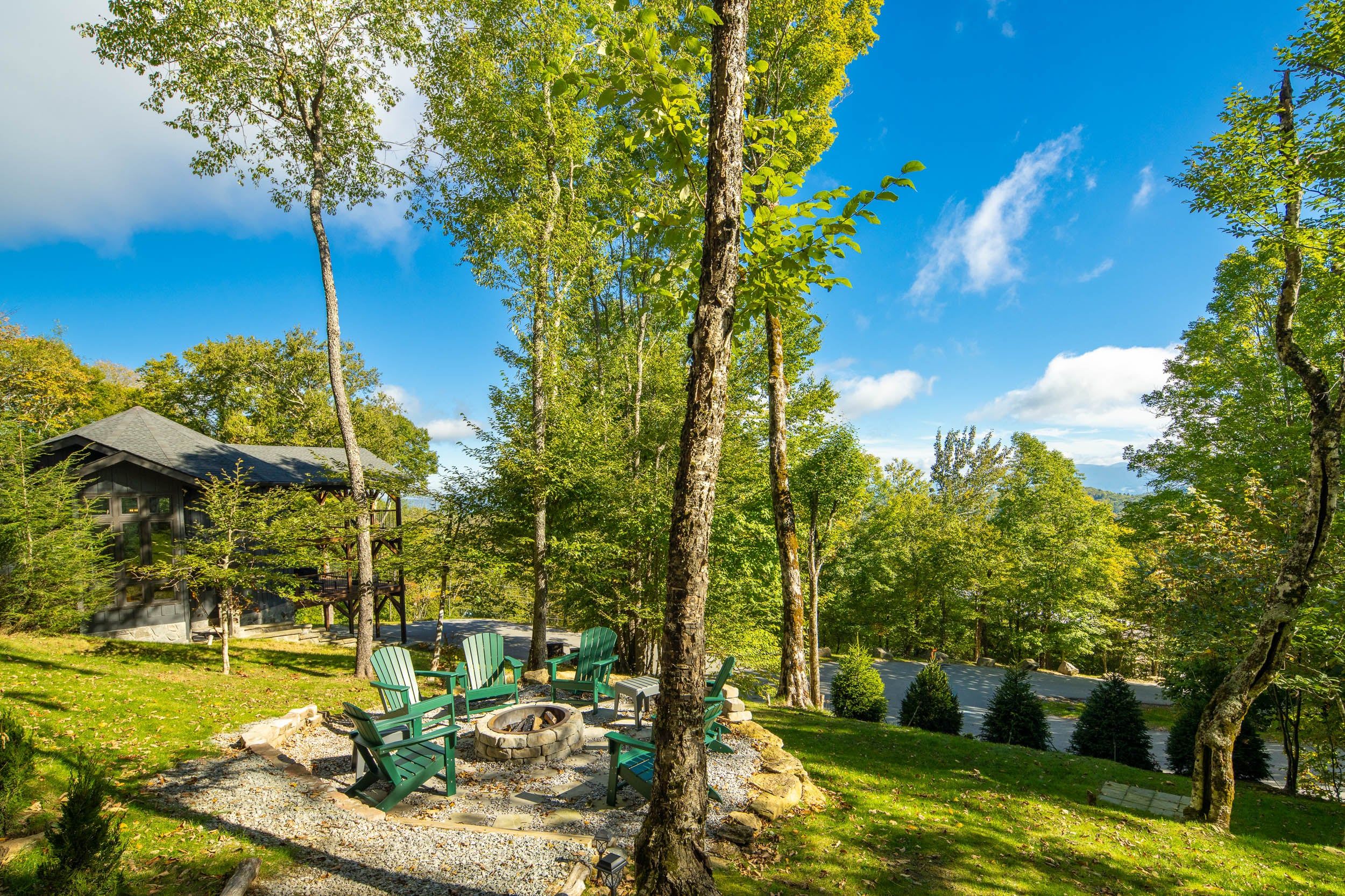Fire pit with Adirondack seating and beautiful mountain scenery