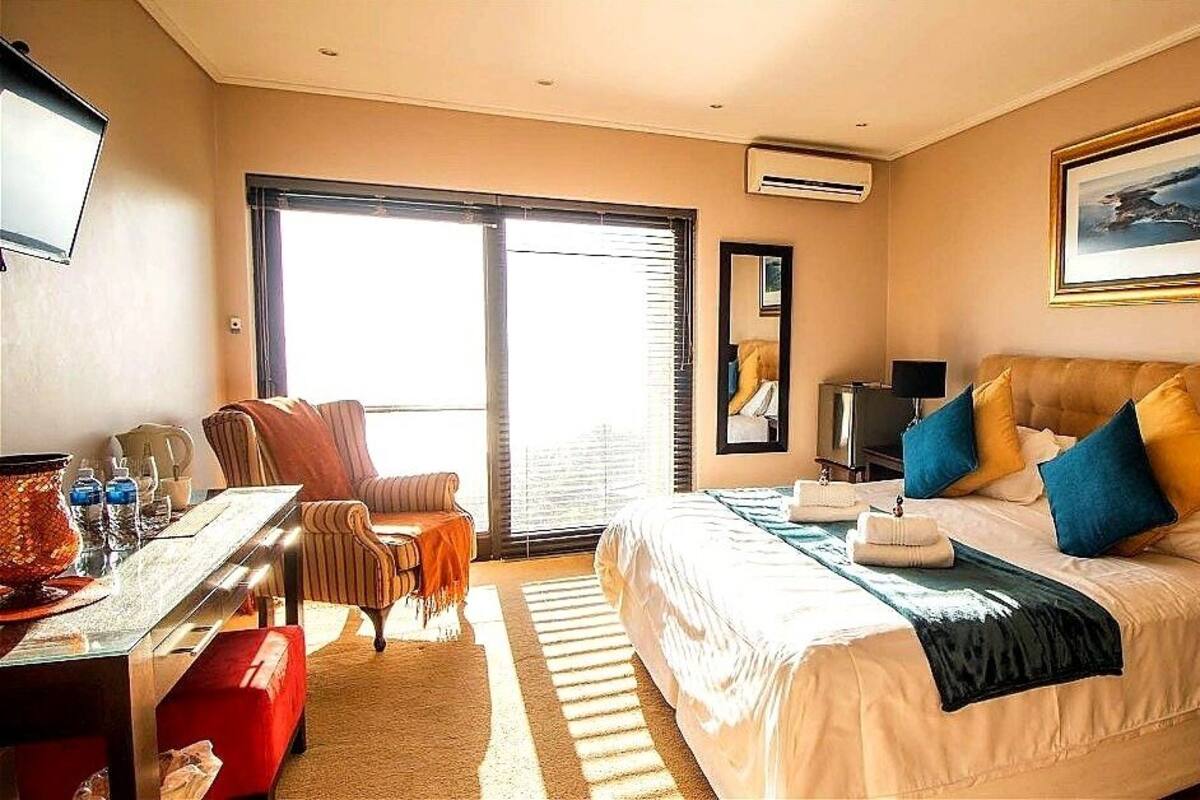 Suite superior, 1 llit de matrimoni, vistes a l'oceà, orientació mar | Minibar, caixa forta a l'habitació i roba de llit 