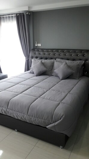 Habitación doble estándar | Escritorio, cortinas blackout, camas extra y wifi gratis