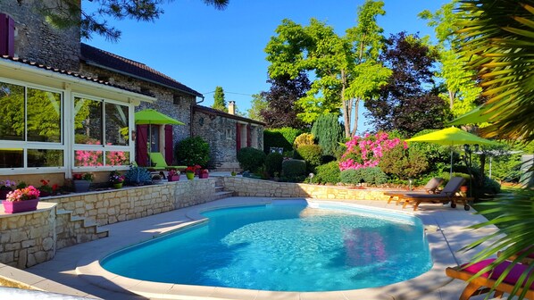 Outdoor pool, pool umbrellas, pool loungers