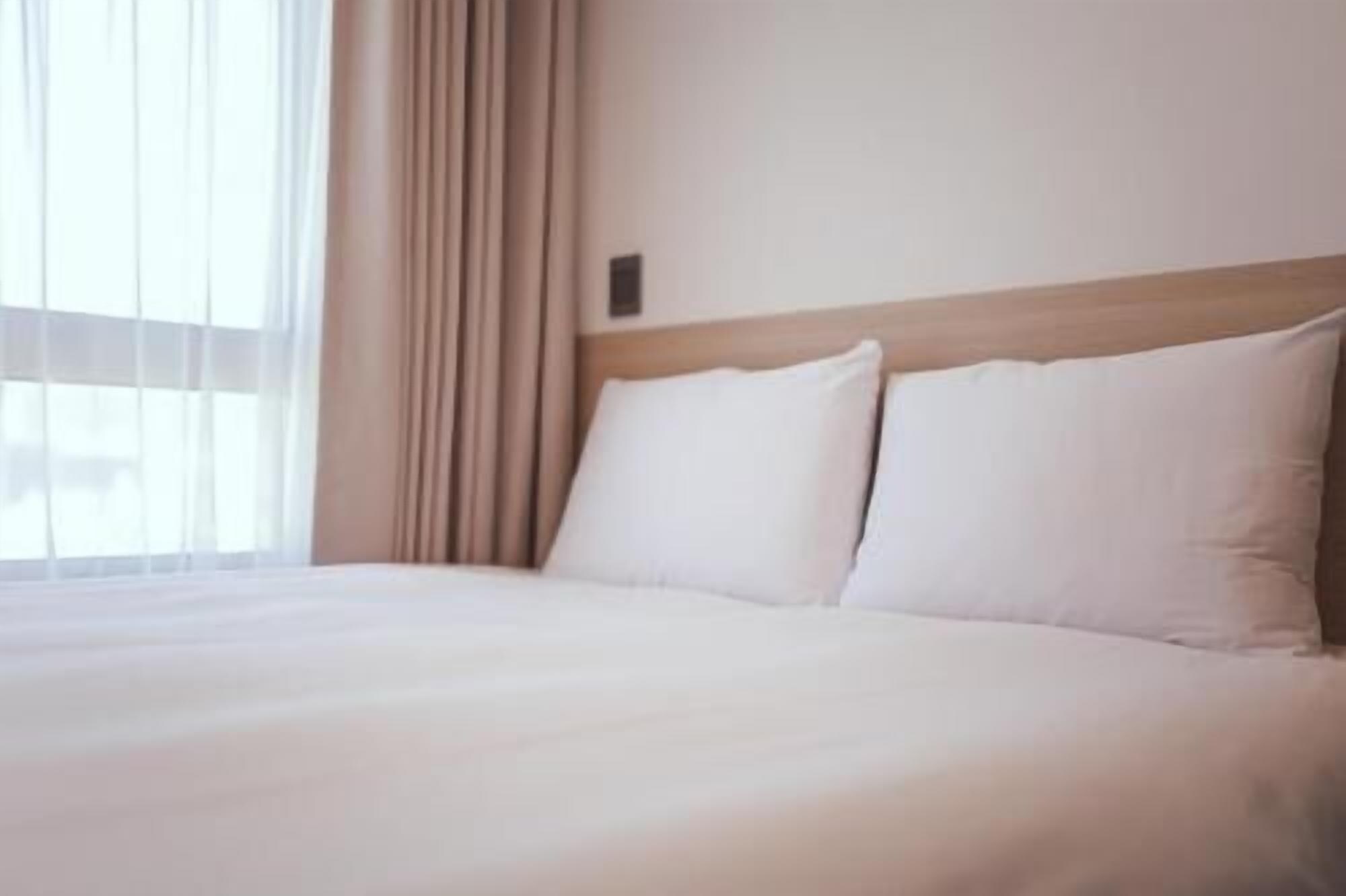 Premium bedding, down duvets, blackout curtains, free WiFi