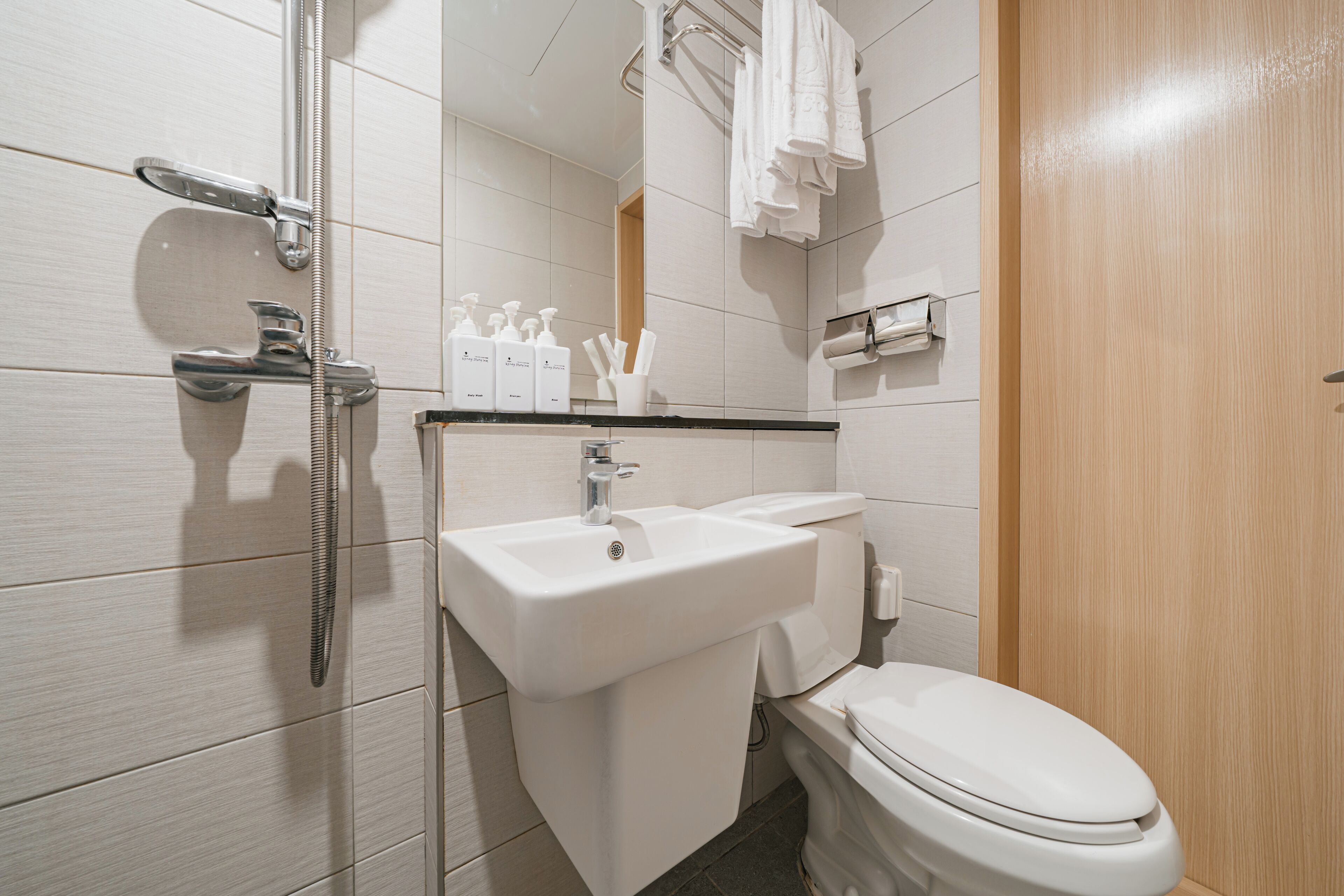 standard twin city ocean view | bathroom | shower, hair dryer, slippers, towels