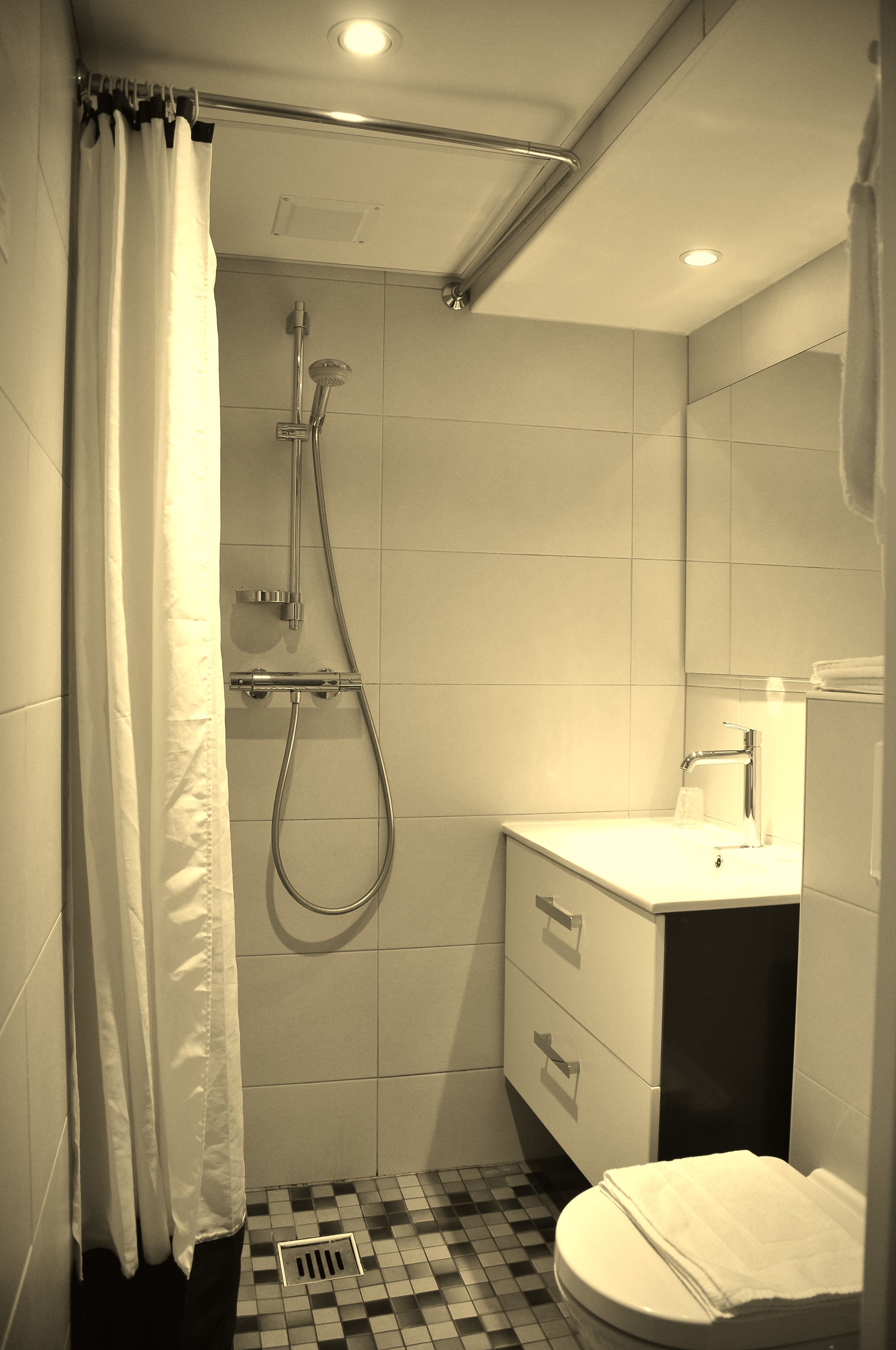 shower, towels, soap, toilet paper