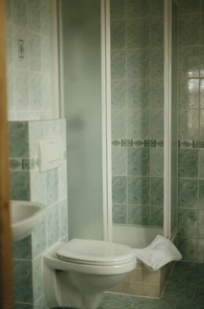 Shower, deep soaking tub, hair dryer, bathrobes