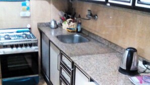 Departamento de lujo, 3 habitaciones, vista al jardín | Cocina privada