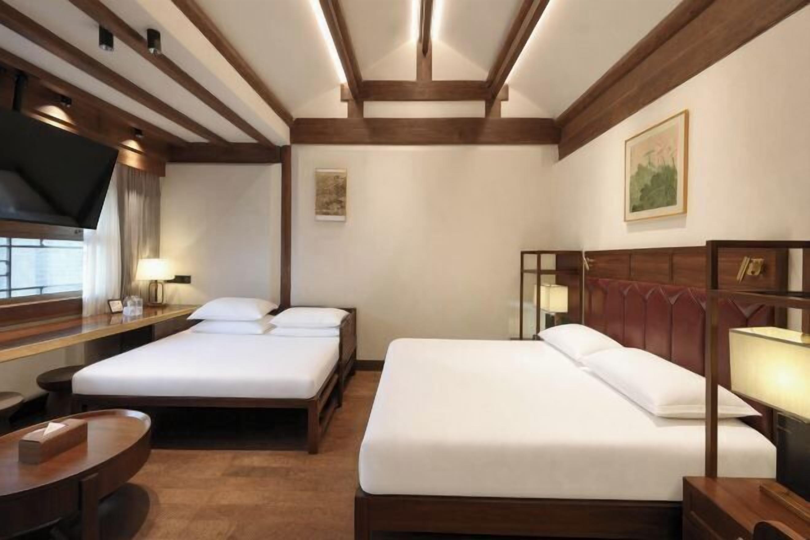 Premium bedding, down duvets, memory-foam beds, minibar