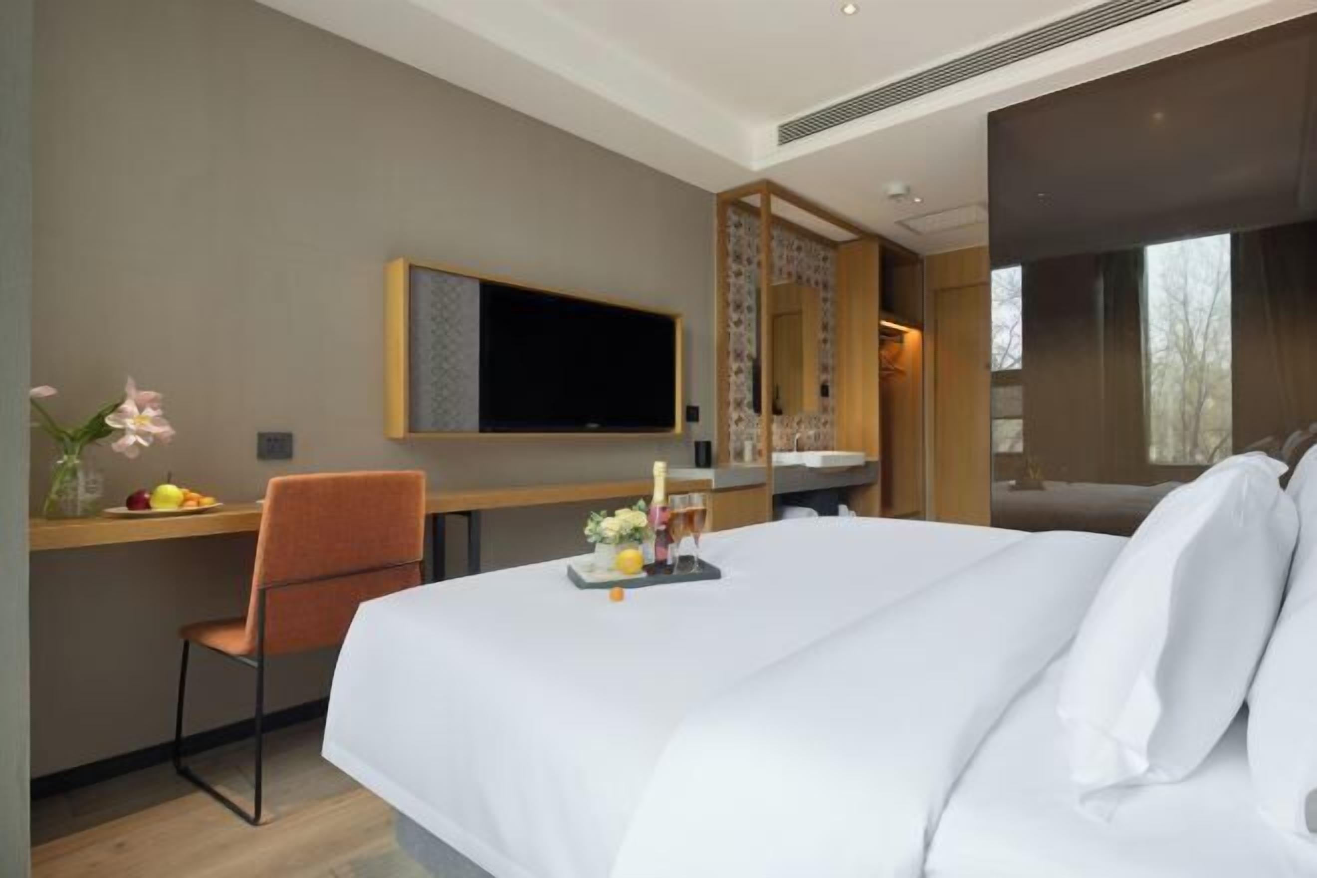 Premium bedding, down duvets, memory-foam beds, minibar