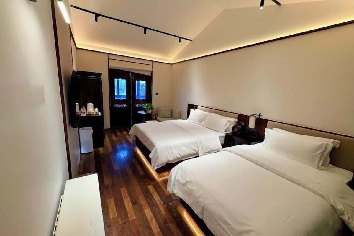 Premium bedding, down comforters, memory foam beds, minibar