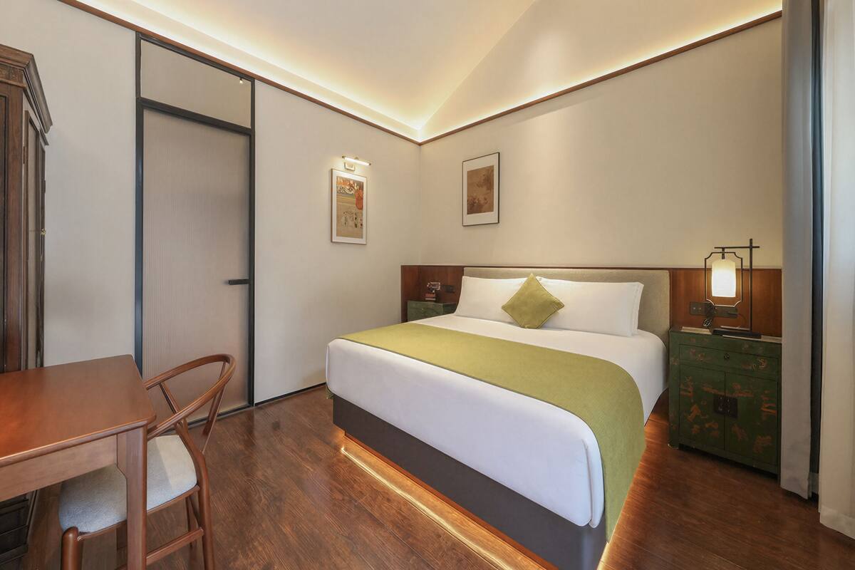 Deluxe Double Room  | Premium bedding, down comforters, memory foam beds, minibar