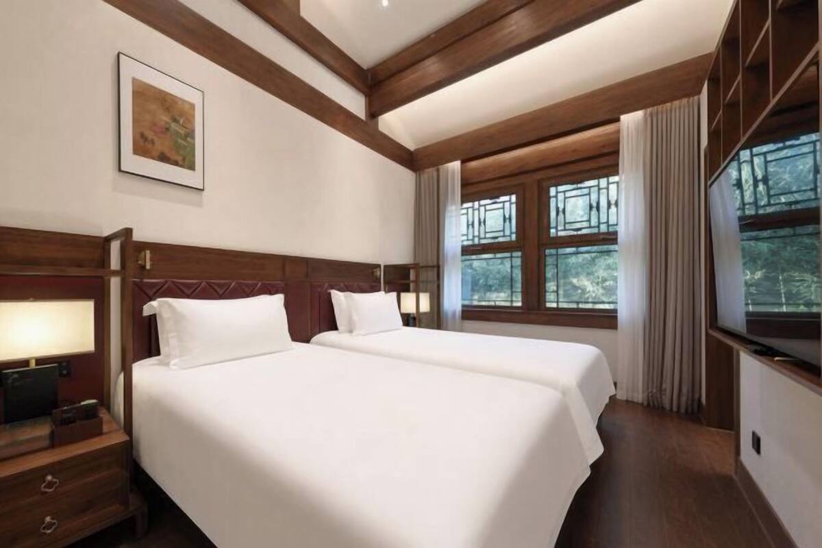 Premium bedding, down comforters, memory foam beds, minibar