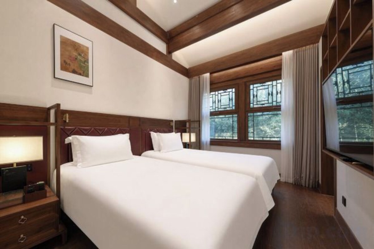 Premium bedding, down comforters, memory foam beds, minibar
