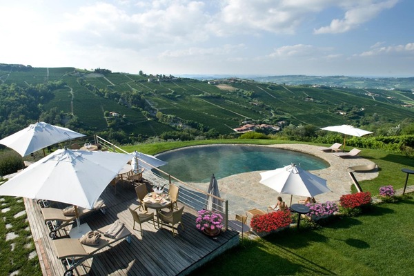 Seasonal outdoor pool, open 10:30 AM to 7:30 PM, pool umbrellas