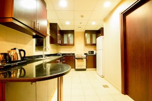 Appartement, 1 chambre | Cuisine privée | Réfrigérateur, micro-ondes, plaque de cuisson, bouilloire électrique