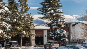 A building with a sign reading "Gros Ventre South." - RMR: Gros Ventre A4 Condo in Teton Village (Teton Village)