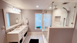 Shower, rainfall showerhead, hair dryer, towels