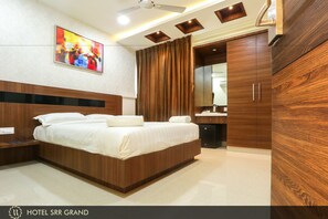 Executive Room | Living room | Flat-screen TV, fireplace - Hotel SRR Grand (Chengalpattu)