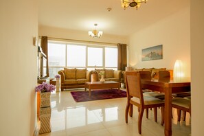 Deluxe Apartment, 2 Bedrooms, Balcony, Ocean View | Living room | LCD TV