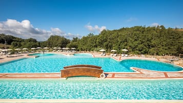 Outdoor pool, pool umbrellas, sun loungers