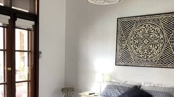 Deluxe Suite, 1 Queen Bed, Ensuite, Poolside | 1 bedroom, desk, soundproofing, iron/ironing board