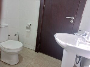 Shower, free toiletries, slippers, towels