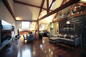 Apartment, 3 Bedrooms | Living area | Flat-screen TV