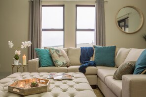 Flat-screen TV, fireplace - The Living Collective (Hilton)