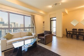 Apartment, 2 Bedrooms, Marina View, Beachside | Living area | Flat-screen TV - Yanjoon Holiday Homes - JBR Amawj 4 (Dubai)