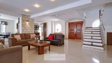 Luxury Villa | Living area | Flat-screen TV, fireplace, DVD player