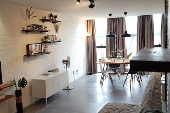 Loft | Living area | Flat-screen TV