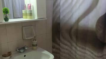 Shower, free toiletries, hair dryer, bathrobes