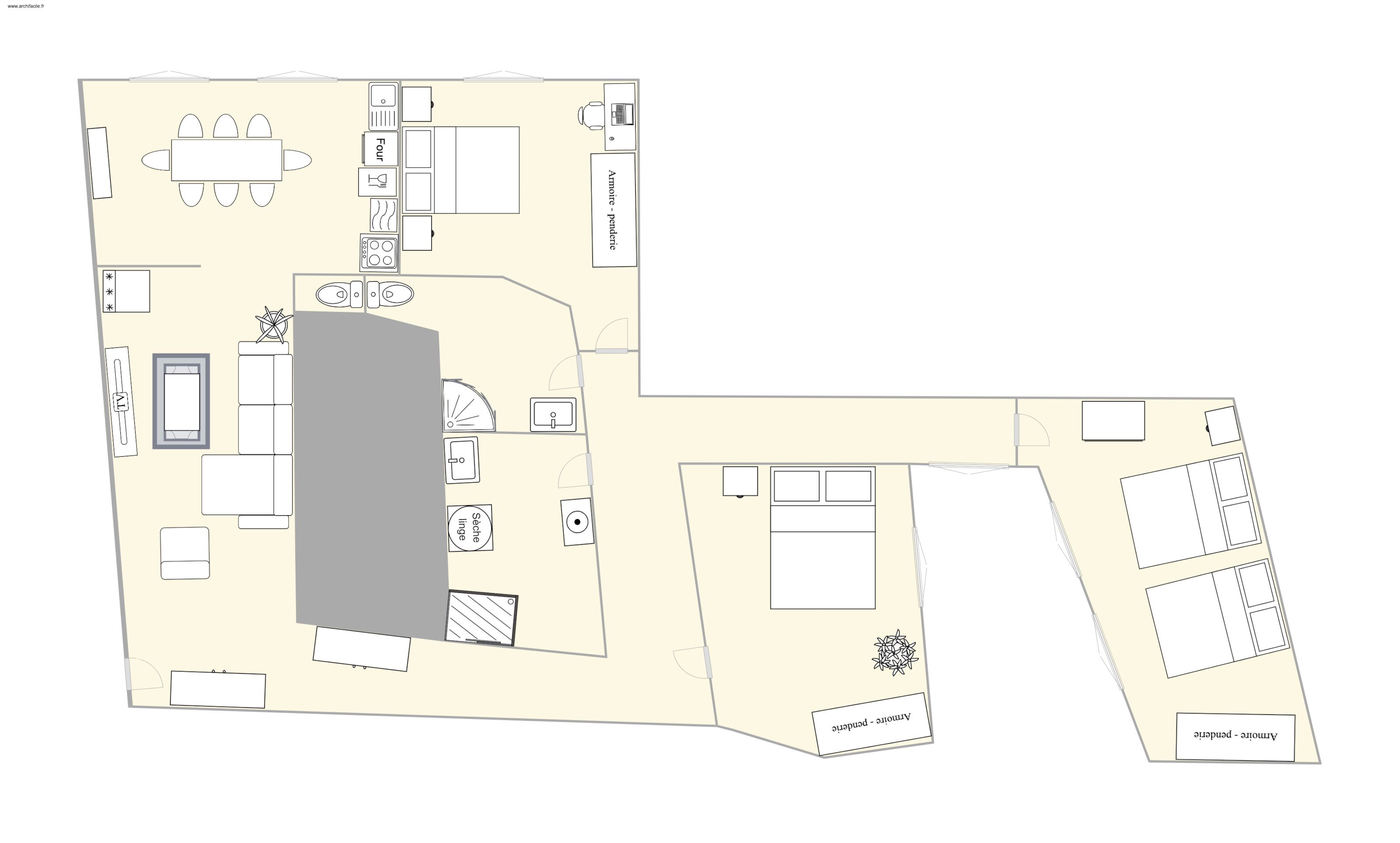 A hotel layout with a dining area, kitchen, and two bedrooms.