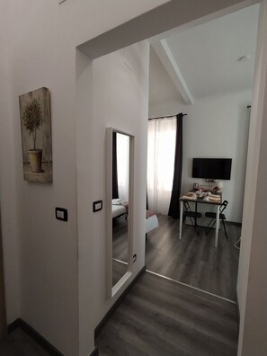 Deluxe Quadruple Room, Private Bathroom, City View | 4 bedrooms, down comforters, minibar, in-room safe - Affittacamere Domus Nikolai (Bari)