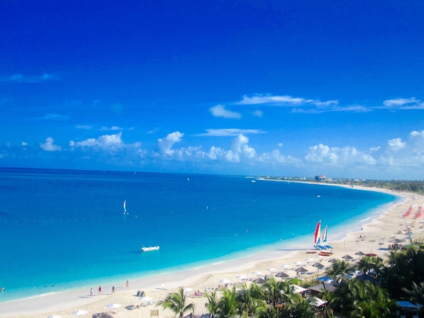 On the beach, sun-loungers, beach towels