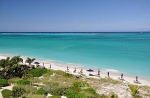 On the beach, sun loungers, beach towels - Hideaway Villa TCI – Steps to Grace Bay Beach, Private Pool with Sunset Views (Providenciales)