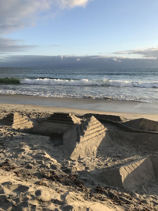 On the beach, sun loungers, beach towels