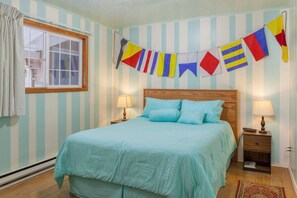 1 bedroom, desk, iron/ironing board, travel crib