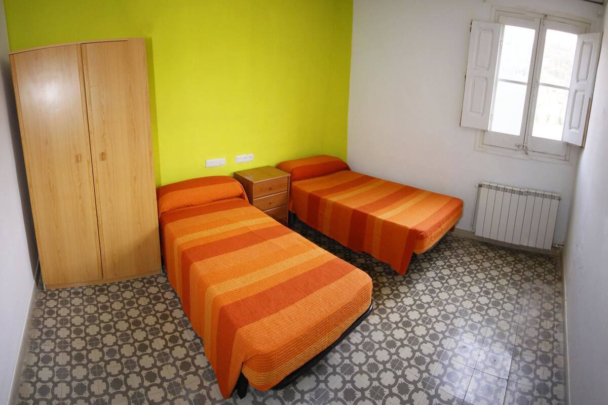 Habitación cuádruple | Cortinas blackout, cunas gratuitas, wifi gratis y ropa de cama 