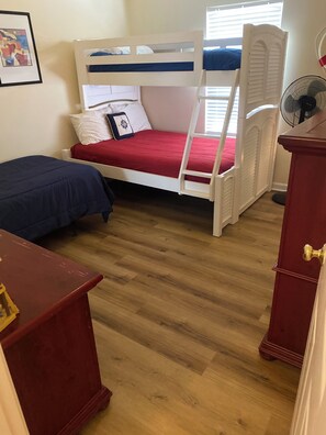 A room with a bunk bed, a desk, and a dresser. - LAKEFRONT, 5 BDRM, Ocean View! Quiet. Fish off deck. Just reduced Aug wks! (Myrtle Beach)