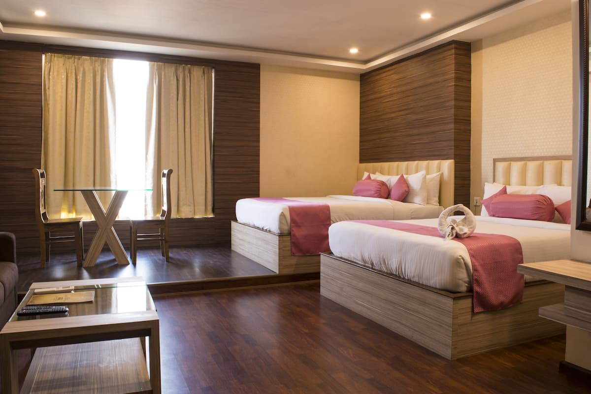 club room | premium bedding, minibar, in-room safe, desk