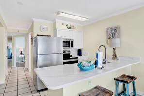 Fridge, microwave, oven, stovetop - Tradewinds 301 | Direct Beach Front Facing Condo! Heated Outdoor Pool Nov till March 31!! (Orange Beach)