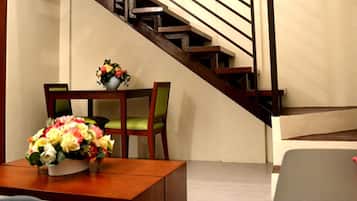 Executive Loft Units | Living area | 52-inch LED TV with cable channels, TV