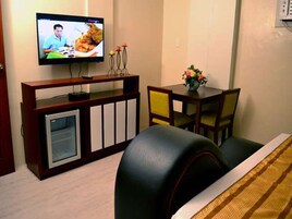 Executive Loft Units | Living area | 52-inch LED TV with cable channels, TV